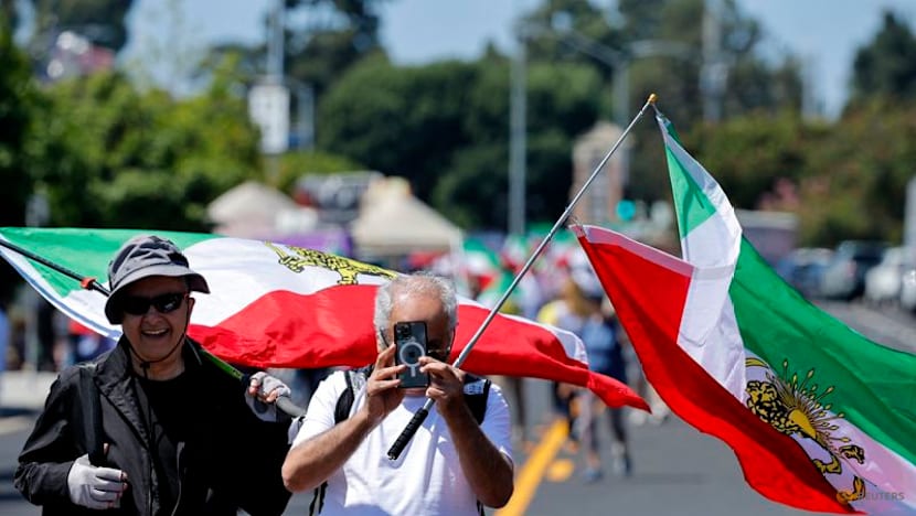 Iranian American protesters gather as soccer team prepare for World Cup opener