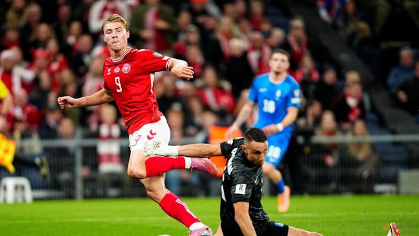 Denmark stay top with 3-1 World Cup qualifying win over Greece