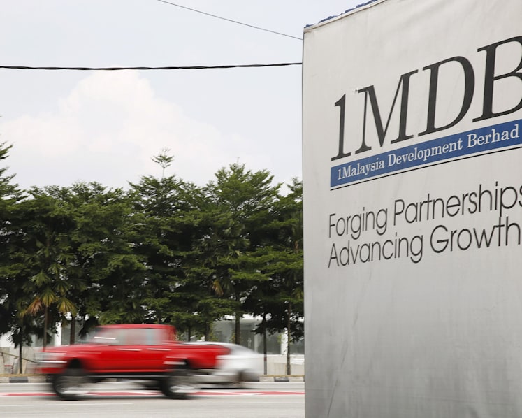 S’pore ex-banker faces two more charges amid 1MDB probe