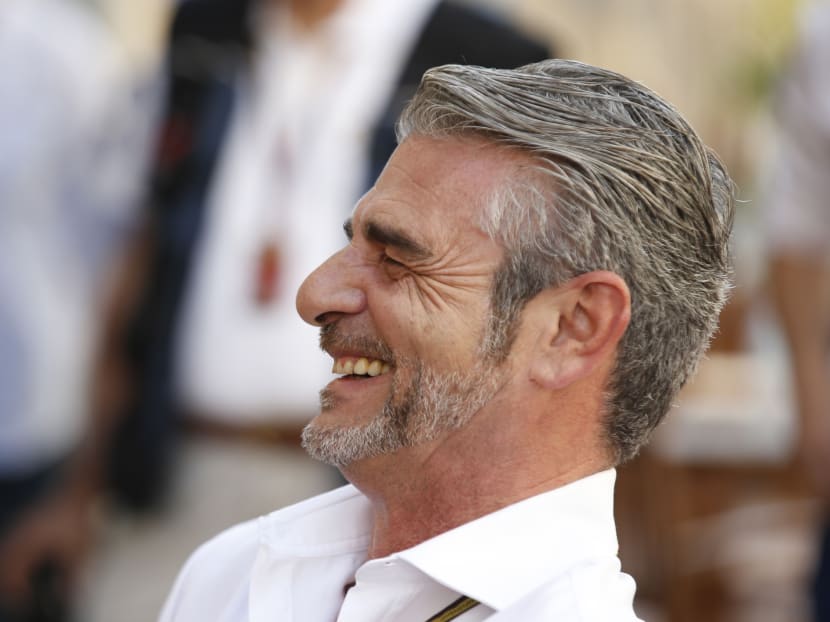 Maurizio Arrivabene, who smiles in the paddock prior to the start of the Emirates Formula One Grand Prix at the Yas Marina racetrack in Abu Dhabi, United Arab Emirates, is replacing Marco Mattiacci as Ferrari's team principal. Photo: AP