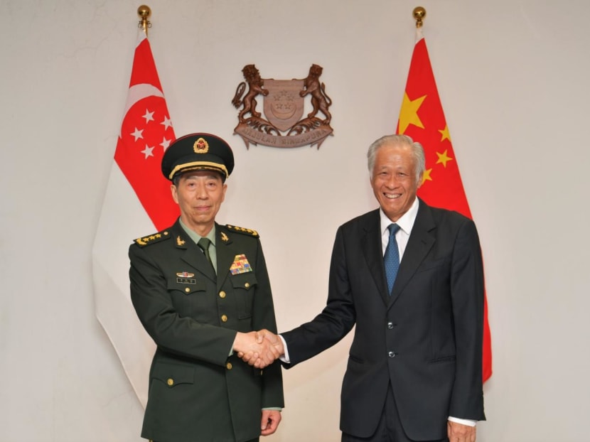 China's Defence Minister Li Shangfu (left) meeting Singapore's Defence Minister Ng Eng Hen on June 1, 2023.  