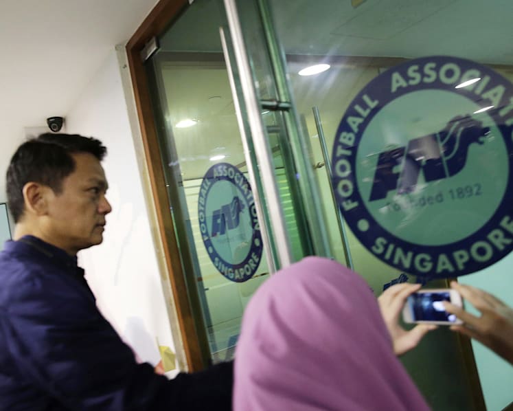 Media gathers from morning as raids at FAS, football clubs continue into the night
