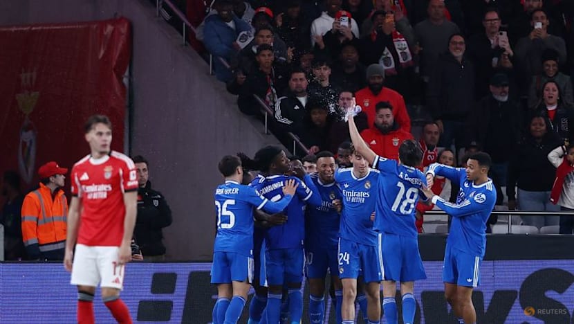 Vinicius earns Real 1-0 win at Benfica in match marred by racism row