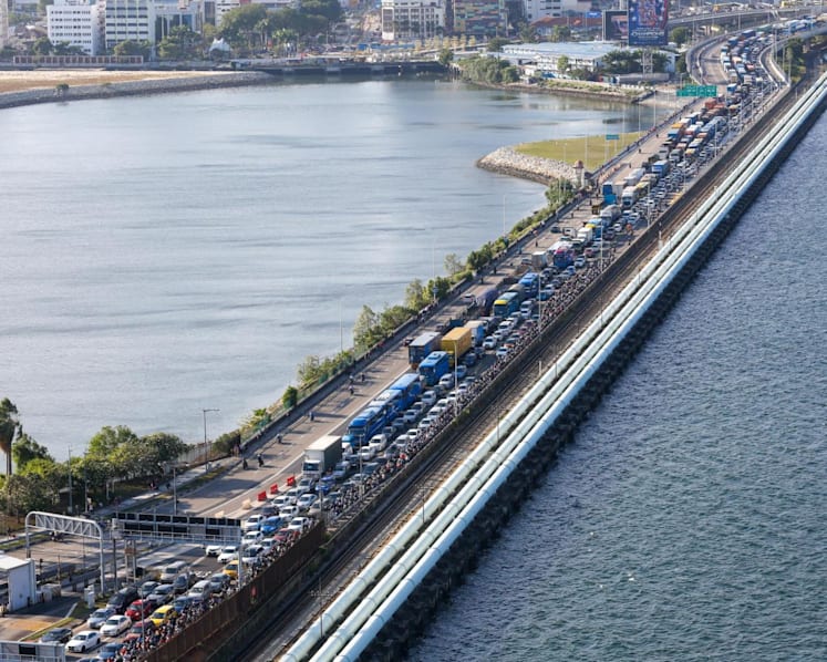 Are queue-cutting motorists largely to blame for jams at Singapore's land checkpoints, and how can improvements be made?