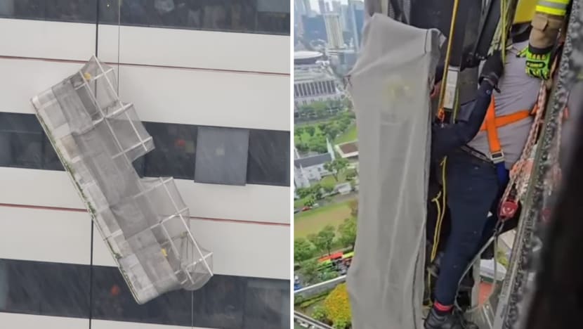 Two workers rescued after being stranded on gondola at Raffles City Tower