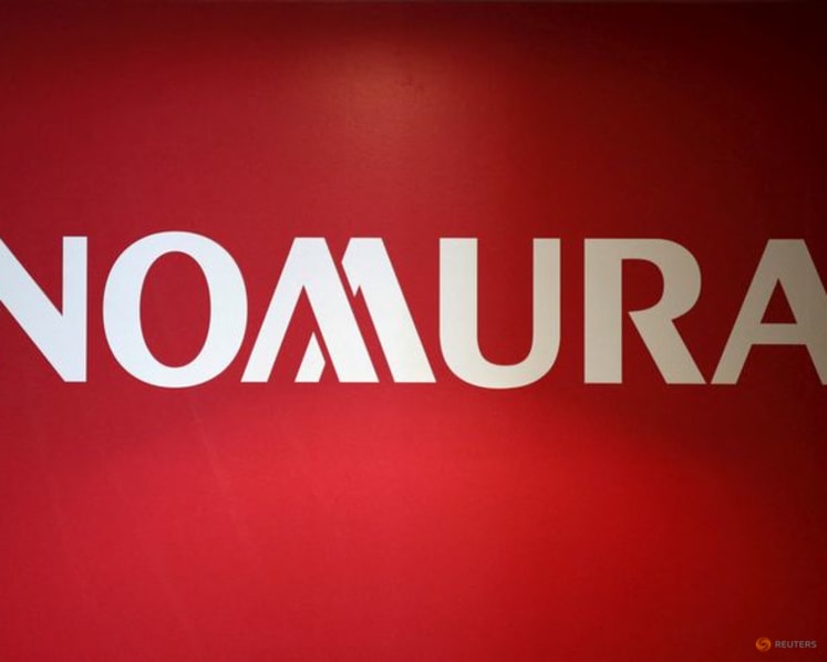 Nomura quarterly profit dips on higher taxes, despite record equity trading