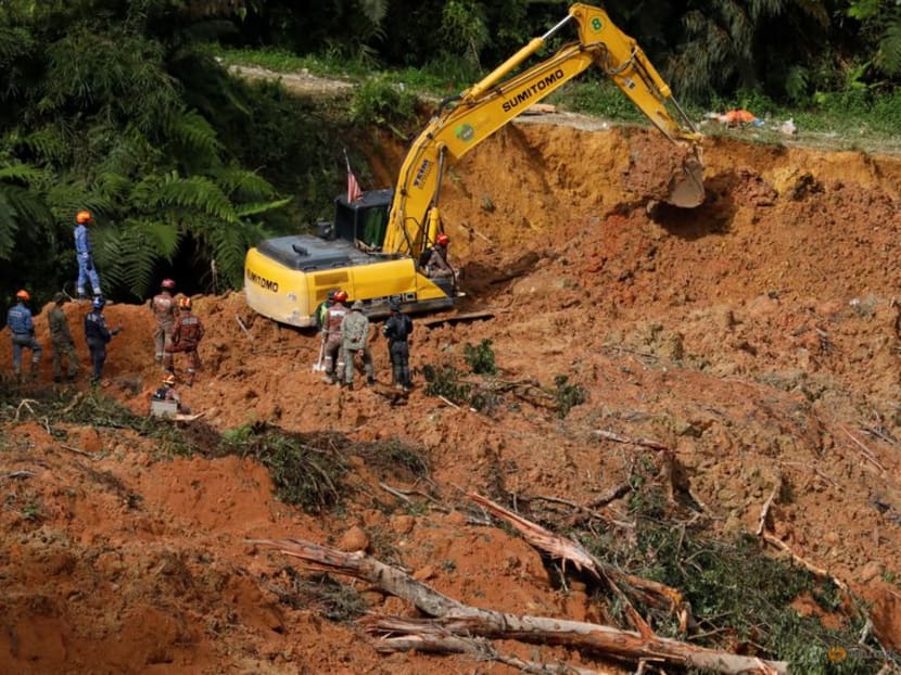 FILE PHOTO: Rescuers work during a rescue and evacuation operation following a landslide at a campsite in Batang Kali, Selangor, Malaysia, December 17, 2022. REUTERS/Hasnoor Hussain FILE PHOTO: Rescuers work during a rescue and evacuation operation following a landslide at a campsite in Batang Kali, Selangor, Malaysia, December 17, 2022. REUTERS/Hasnoor Hussain