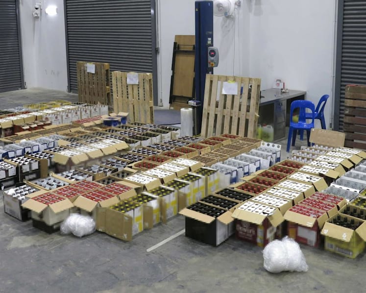 Man fined over S$700,000 for role in scheme to evade duty, GST by illegally diverting liquor for local sale