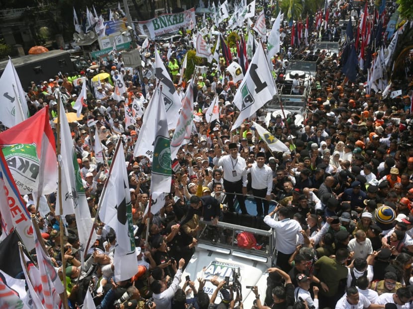 Mr Anies Baswedan and his running mate Mr Muhaimin Iskandar wave as they arrive at the election commission to register themselves in Jakarta, Indonesia on Oct 19, 2023. Mr Anies Baswedan and his running mate Mr Muhaimin Iskandar wave as they arrive at the election commission to register themselves in Jakarta, Indonesia on Oct 19, 2023.