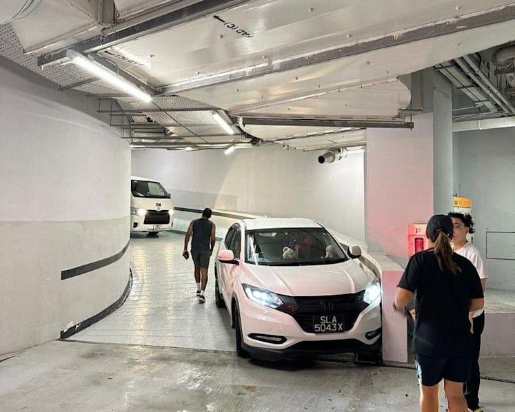 Multiple cars crash into Funan mall car park wall during heavy rain