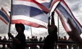 Thailand's ruling political dynasty faces day of legal peril