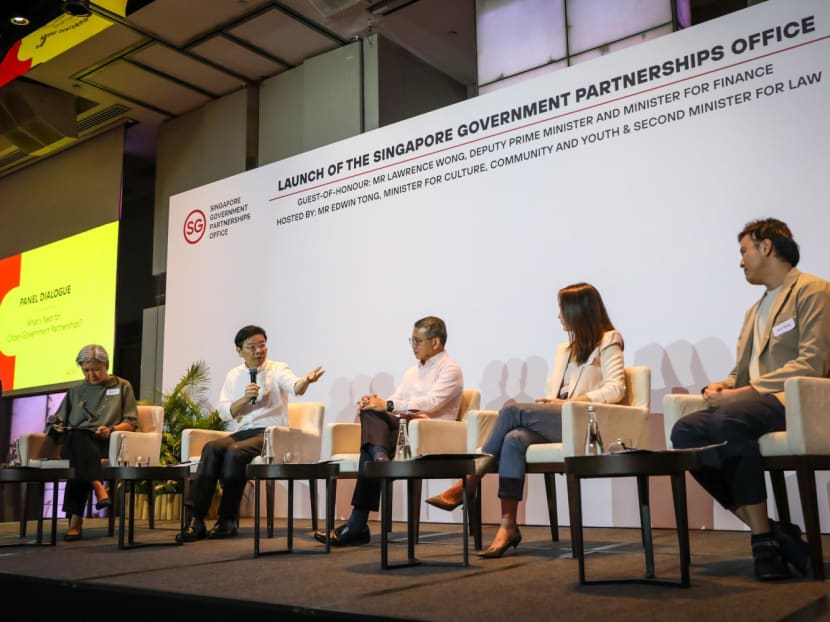 Dialogue during the launch of the Singapore Government Partnerships Office (SGPO) on Jan 19, 2024, between (from left) Dawn Yip, coordinating director, SGPO, DPM Lawrence Wong, Minister for Culture, Community and Youth Edwin Tong, Dr Carol Soon, Principal Research Fellow at the Institute of Policy Studies, and Mr Larry Yeung, Executive Director of Participate in Design (P!D), a non-profit design organisation.