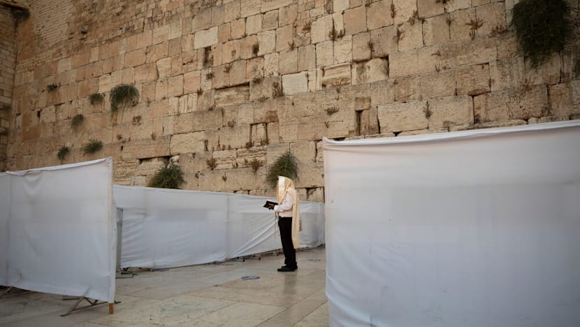 Israel allows up to 100 worshippers at Western Wall amid war restrictions