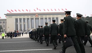 China removes five generals from national lawmaking body
