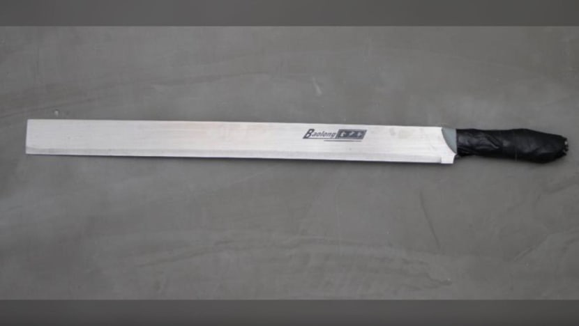 Man charged with throwing 'watermelon knife' at police officer in Bukit Batok Man charged with throwing 'watermelon knife' at police officer in Bukit Batok