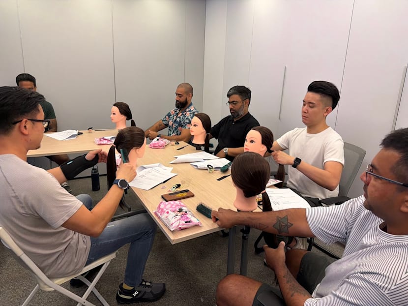 These stay-at-home dads started a workshop to help fathers style their daughters' hair