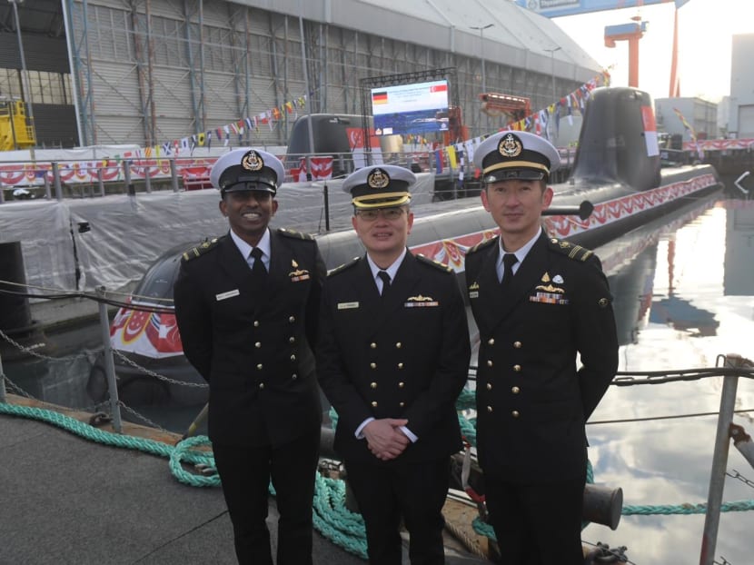 From left: Military Expert 2 Navinraj Chandra Segran, Lieutenant Colonel Phang Chun Chieh and Military Expert 3 Marcus Chua at the launch of two Republic of Singapore Navy submarines in Kiel, Germany, on Dec 13, 2022.
From left: Military Expert 2 Navinraj Chandra Segran, Lieutenant Colonel Phang Chun Chieh and Military Expert 3 Marcus Chua at the launch of two Republic of Singapore Navy submarines in Kiel, Germany, on Dec 13, 2022.