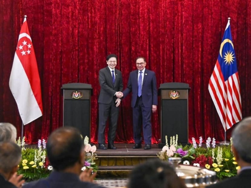 Singapore Prime Minister Lawrence Wong (left) and Malaysia Prime Minister Anwar Ibrahim after their joint press conference in Putrajaya on June 12, 2024.