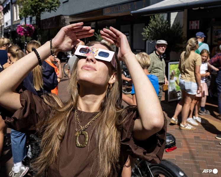 Skywatchers gather in Europe to see total solar eclipse