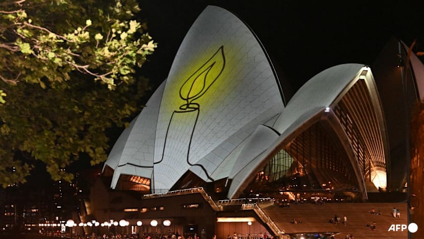 Australia falls silent, lights candles for Bondi Beach shooting victims