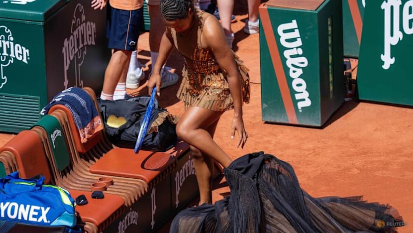 Osaka embracing role as entertainer after another grand walk-on