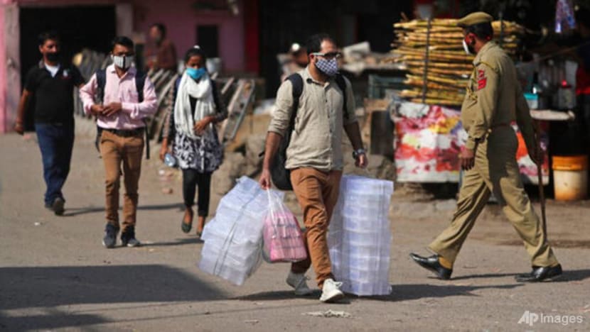 India's daily COVID-19 infections at lowest in 3 months