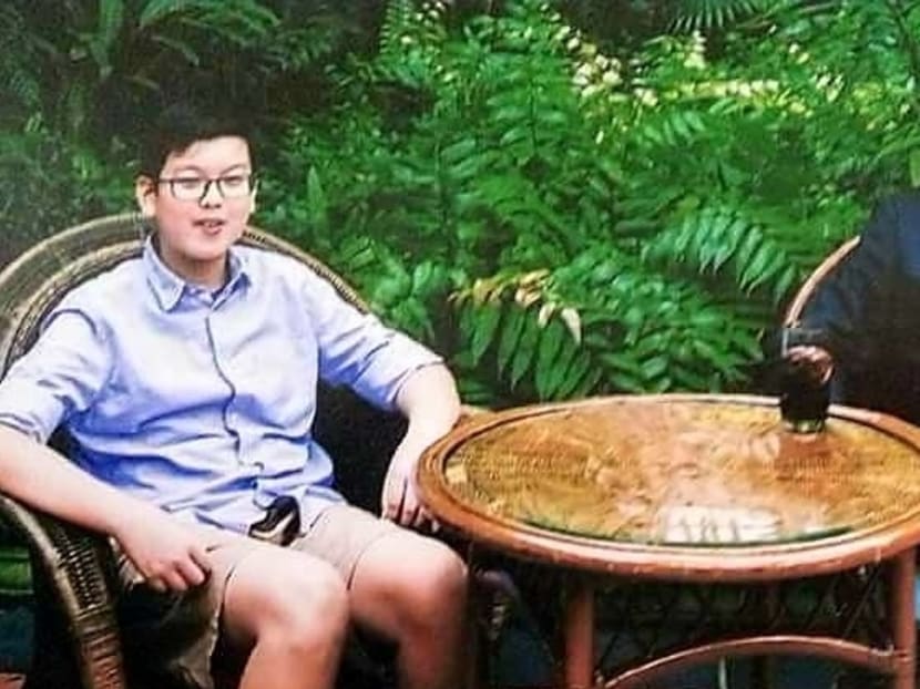 Benjamin Sim (left), seen here with his father, Davy Sim, died after completing a 2.4km run during physical education class on Tuesday morning (Aug 1). Photo: Facebook