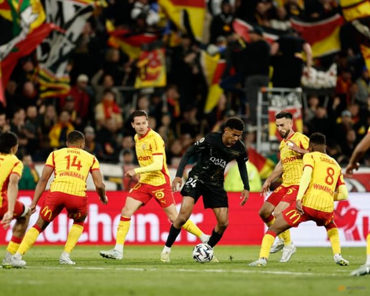 PSG crowned French champions again after win at second-placed Lens