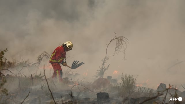 France and Spain battle 'unpredictable' wildfires as 300,000 evacuated