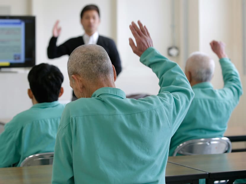 Inmates listen to a lecture by Takeshi Izumaru, director at the Nagasaki Community Support Center at Sasebo Prison in Sasebo, Nagasaki Prefecture, Japan. Photo: Bloomberg Inmates listen to a lecture by Takeshi Izumaru, director at the Nagasaki Community Support Center at Sasebo Prison in Sasebo, Nagasaki Prefecture, Japan. Photo: Bloomberg