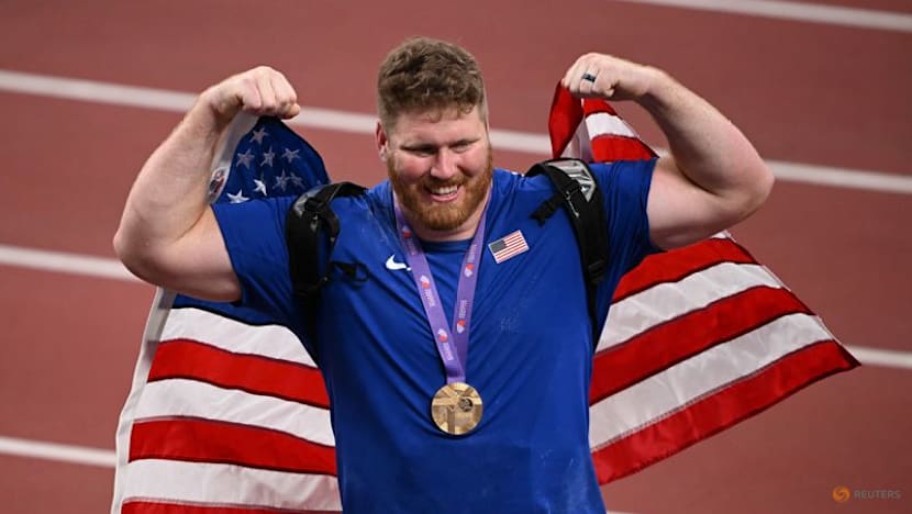 Injury-ravaged Crouser wins astounding third shot gold