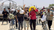Israeli fire kills 35 people in Gaza, many at aid site, medics say