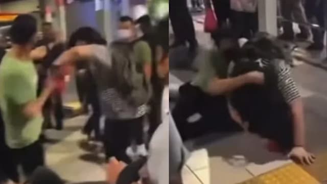 新山关卡两男子疑因插队打架 警方正确认涉事者身份