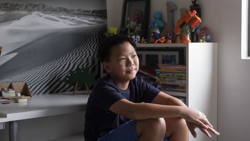Walking the talk: Oliver Chua, 11, takes shorter showers, buys used toys, and aims to convince peers to do the same