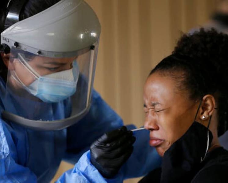 US sets record for COVID-19 cases amid election battle over virus 