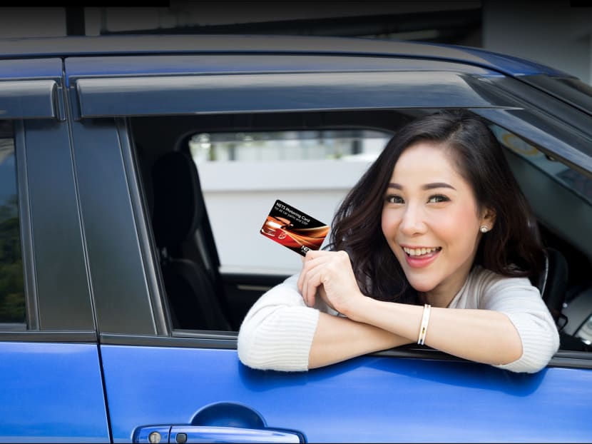 The NETS Motoring Card is the only motoring card that can pay for all car park and ERP charges. Photos: NETS