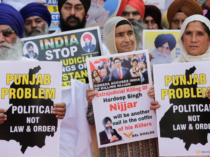 People hold placards protesting the killing of Canadian Sikh separatist leader Hardeep Singh Nijjar at a demonstration outside the Golden Temple in Amritsar, in the northern state of Punjab, India, on Sept 29, 2023. People hold placards protesting the killing of Canadian Sikh separatist leader Hardeep Singh Nijjar at a demonstration outside the Golden Temple in Amritsar, in the northern state of Punjab, India, on Sept 29, 2023.