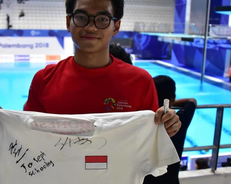 Schooling mania strikes Jakarta as Indonesians cheer Singapore's golden boy 
