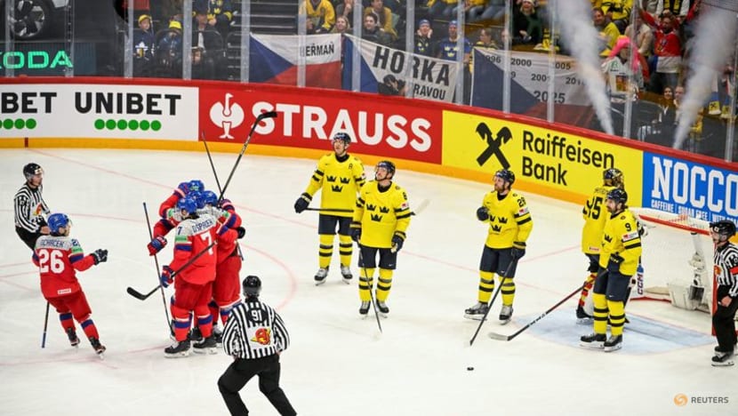 Ice hockey-Denmark stun Canada, Swedes beat Czechs to reach world championship semis