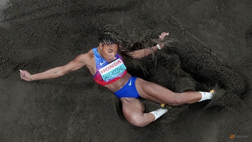 Davis-Woodhall adds world long jump title to Olympic crown