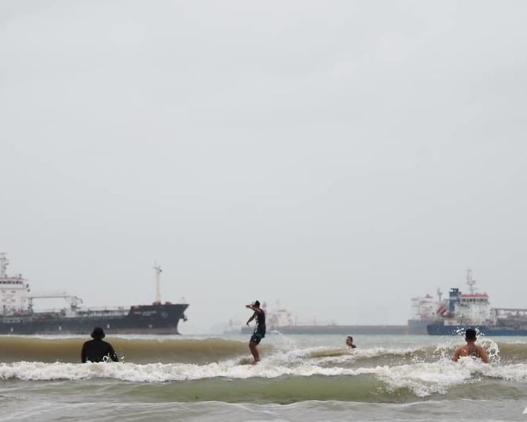 Surf's up in Singapore: Rare waves at Changi draw surfers unable to travel for their sport