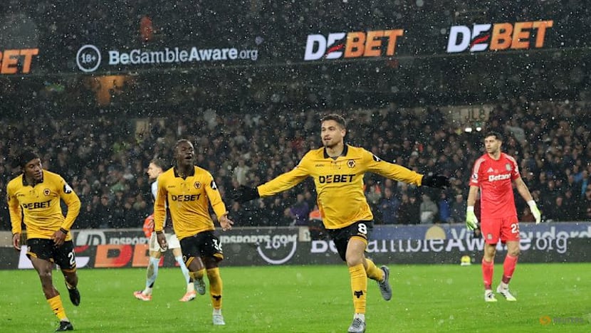 Wolves avoid unwanted record with 2-0 win over local rivals Villa