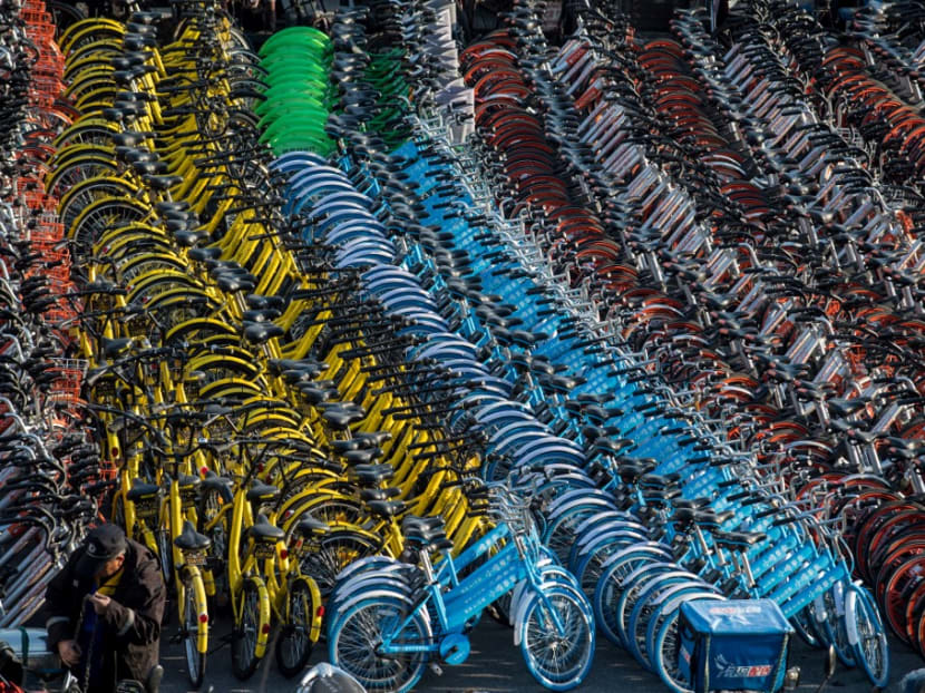 This picture taken on March 1, 2017 shows impounded bicycles from the bike-sharing schemes Mobike and Ofo in Shanghai.