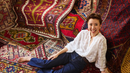This passionate collector of vintage tribal rugs uses them to style her home in Singapore