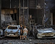 Russian attacks kill six, injure dozens in Ukraine, Moscow says it hits ships, plants