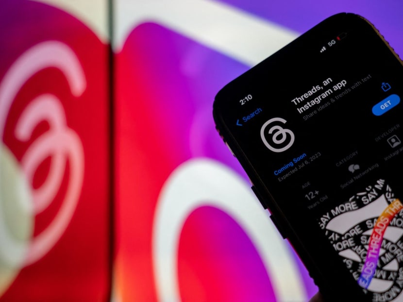 This photo illustration created in Washington, DC, on July 5, 2023, shows Threads, an Instagram app, on the App Store, in front of the logos of Instagram and Threads. This photo illustration created in Washington, DC, on July 5, 2023, shows Threads, an Instagram app, on the App Store, in front of the logos of Instagram and Threads.
