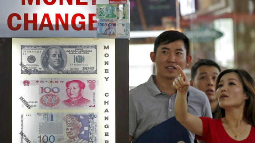 More people buying Chinese yuan at money changers in Singapore as currency weakens