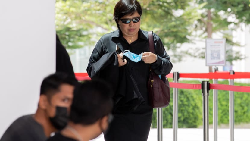 Woman in viral MBS video charged with not wearing face mask outside court, breaching stay-home notice