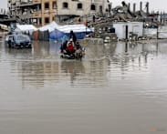 Gaza families struggle to recover from days of torrential rains that killed 12 people
