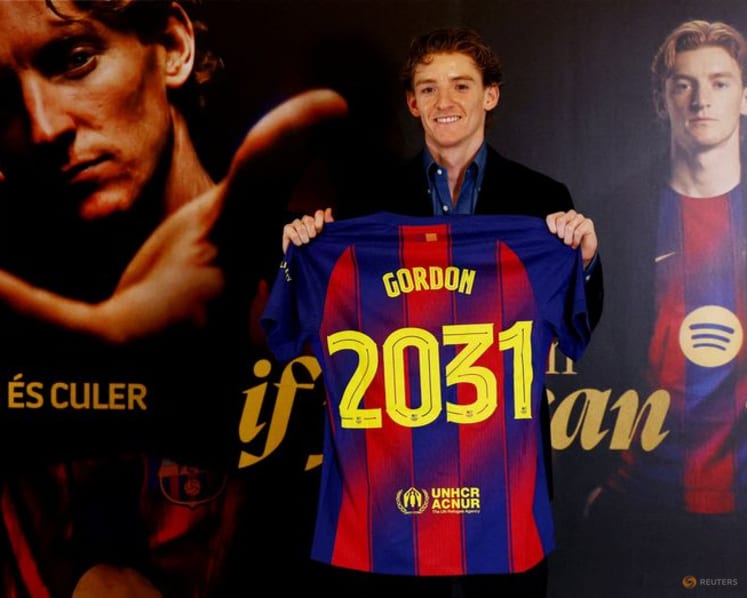 Barcelona sign England winger Gordon from Newcastle